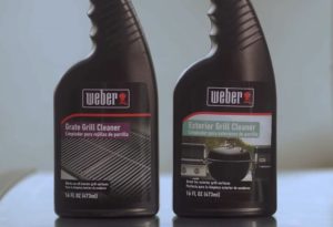 two spray bottles of Weber grill cleaning liquids